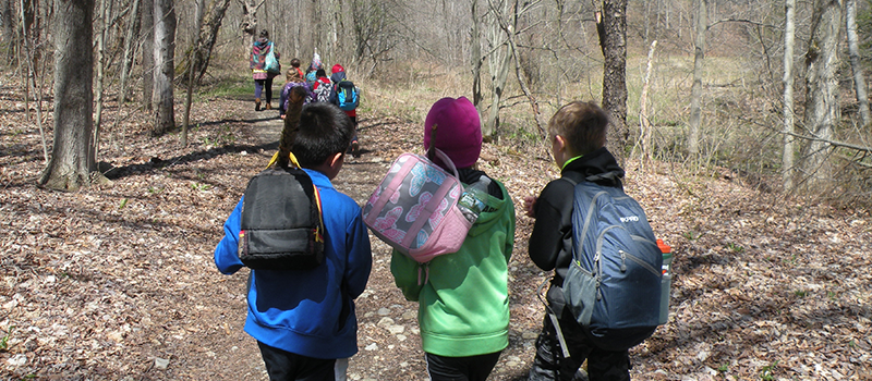 kids hiking at spring camp at baltimore woods