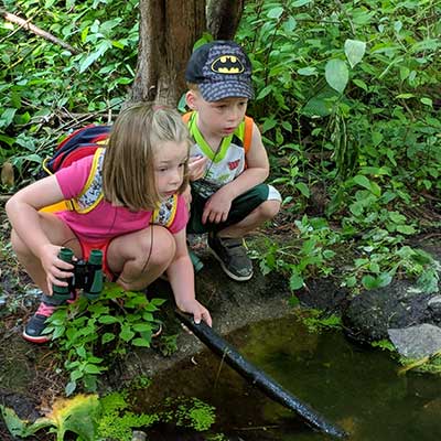 kids-search-water-with-stick