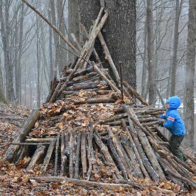 Fort building at Trail School at Baltimore Woods.