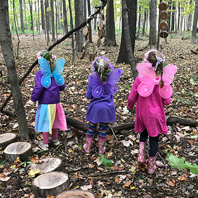 Participants of the Fairy Festival at Baltimore Woods wearing butterfly wings.