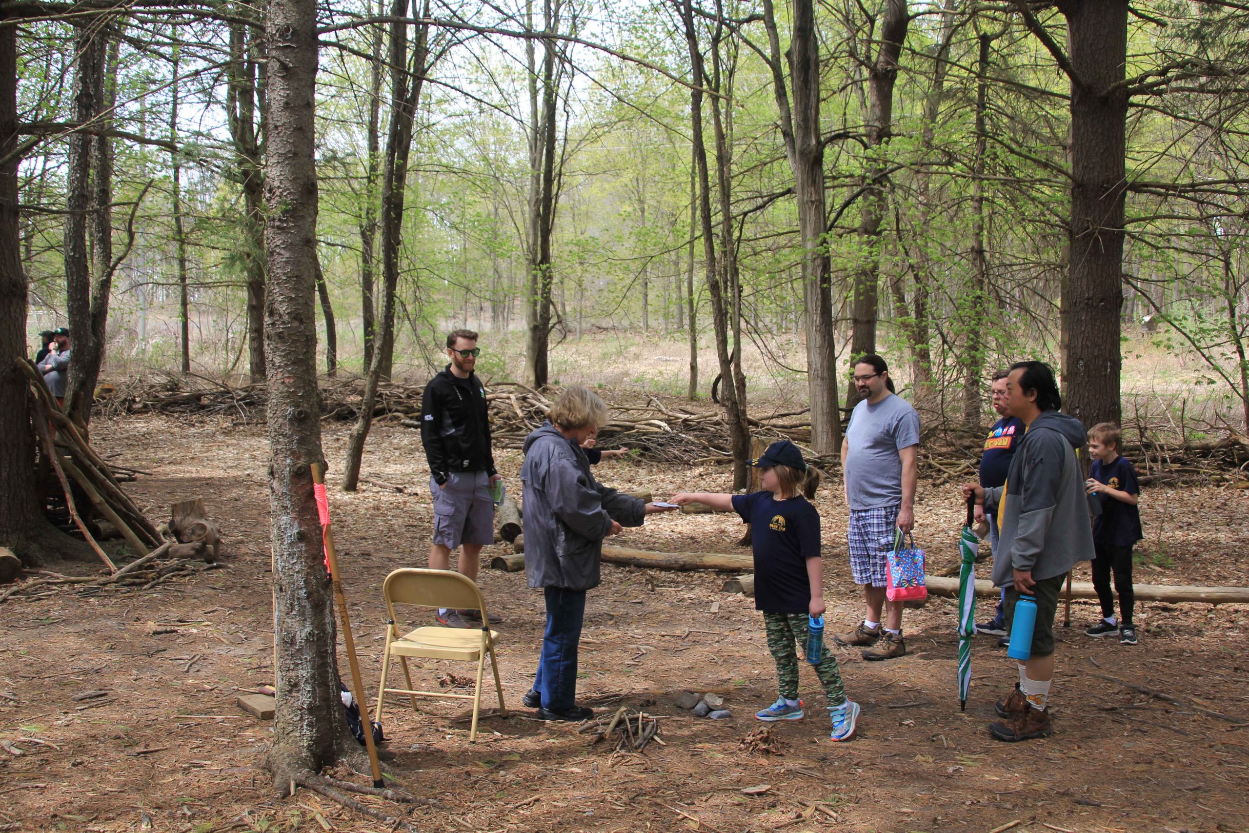 Volunteers in the nature play area at the 2023 Earth Day Celebration at Baltimore Woods.