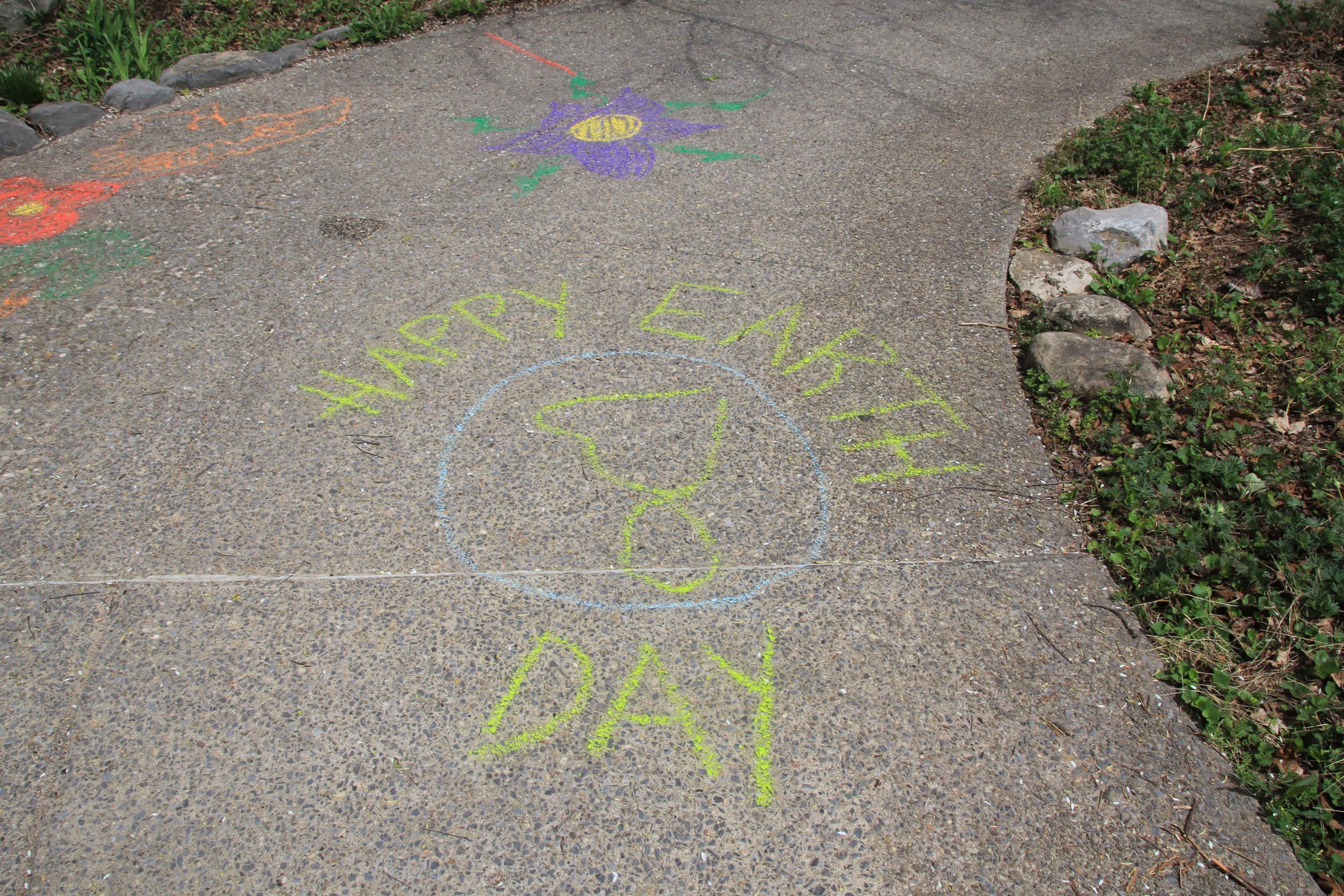 Earth Day chalk drawing at the 2023 Earth Day Celebration at Baltimore Woods.