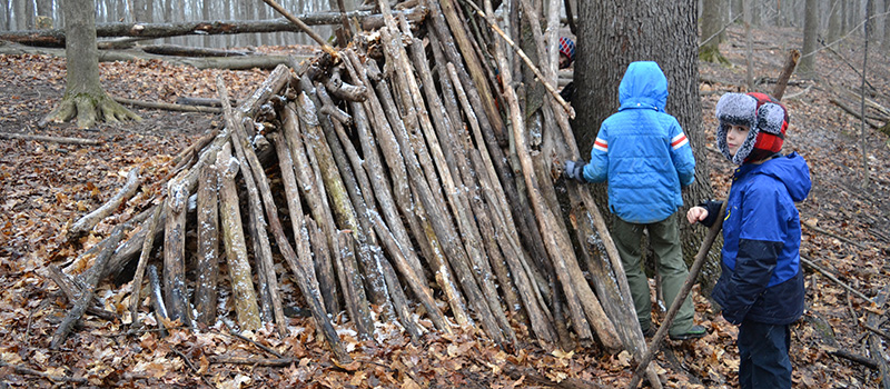 Campers building a fort at Baltimore Woods