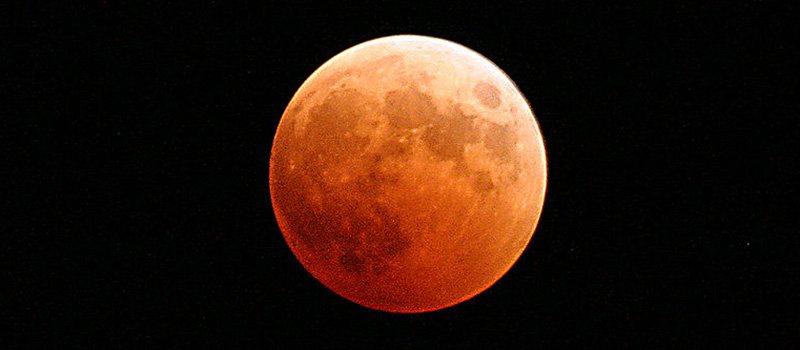 Red moon in the night sky