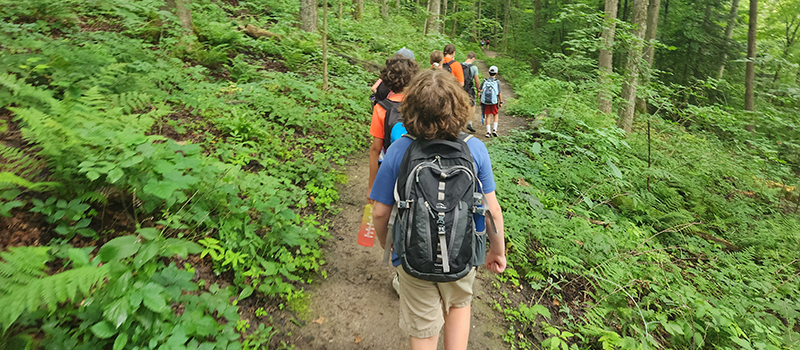 Campers hiking at Baltimore Woods.