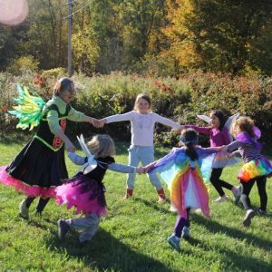 Participants Dancing at the 2024 Fairy Festival at Baltimore Woods Nature Center.