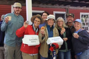 A-Team volunteers at Baltimore Woods with Skaneateles Bakery treats.