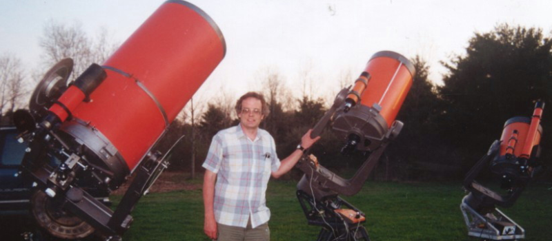 Person using a large telescope